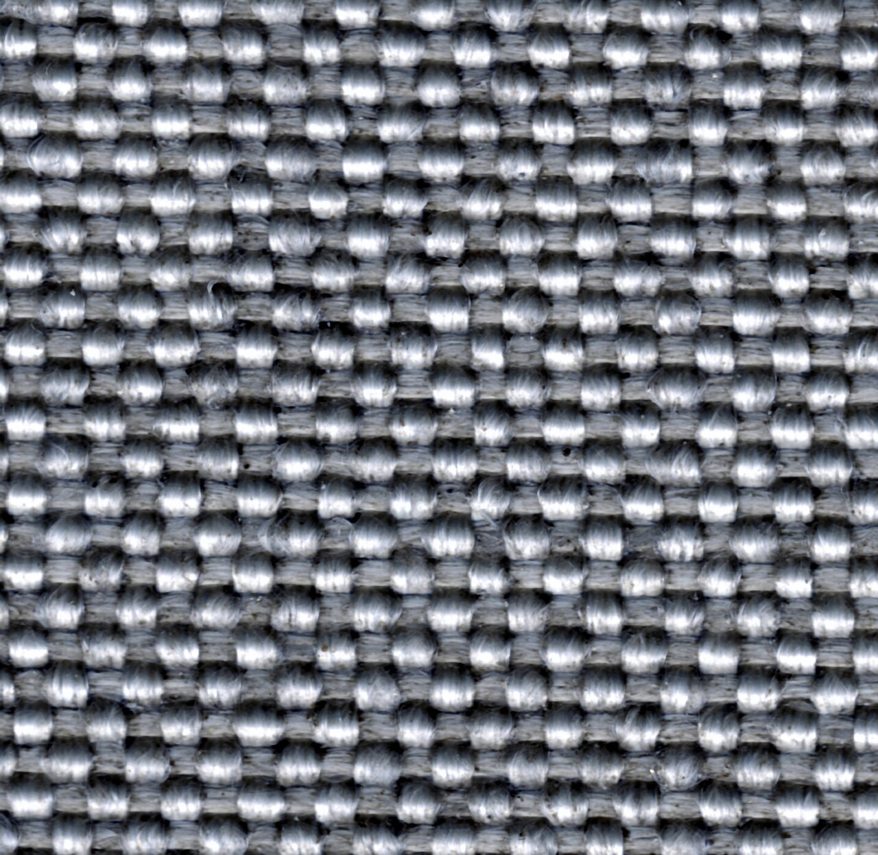 Photographie réelle d'un tissu de fibre de verre tissé en gros plan